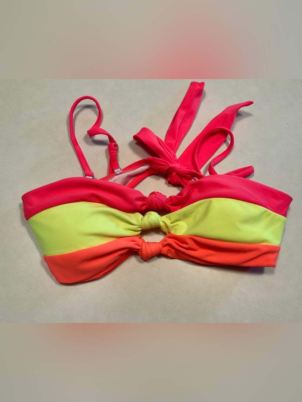 Popvil bikini top features a neon color-block design with a strapless bandeau